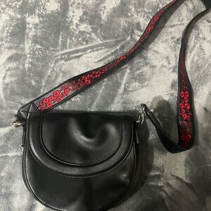 Express Black Crossbody Bag with Red Floral Detail